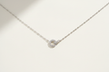 Collier argent cercle zircon en V