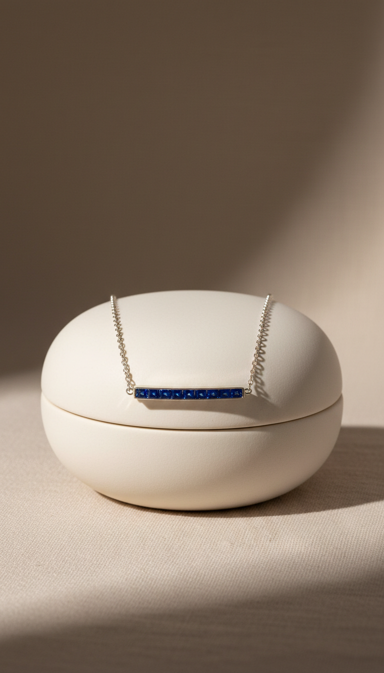 Collier barre saphirs taille baguette